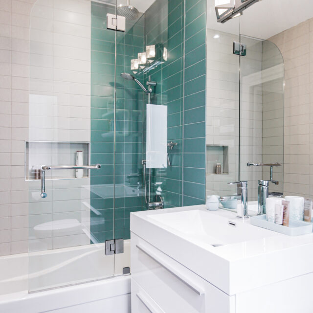 Bathroom Interior with White and Green Tiles